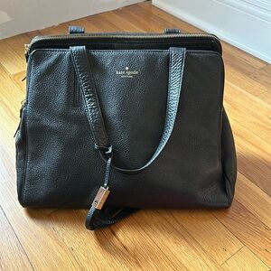 Keith spade women’s work/tote bag in leather. Multiple pockets. Hold laptop.